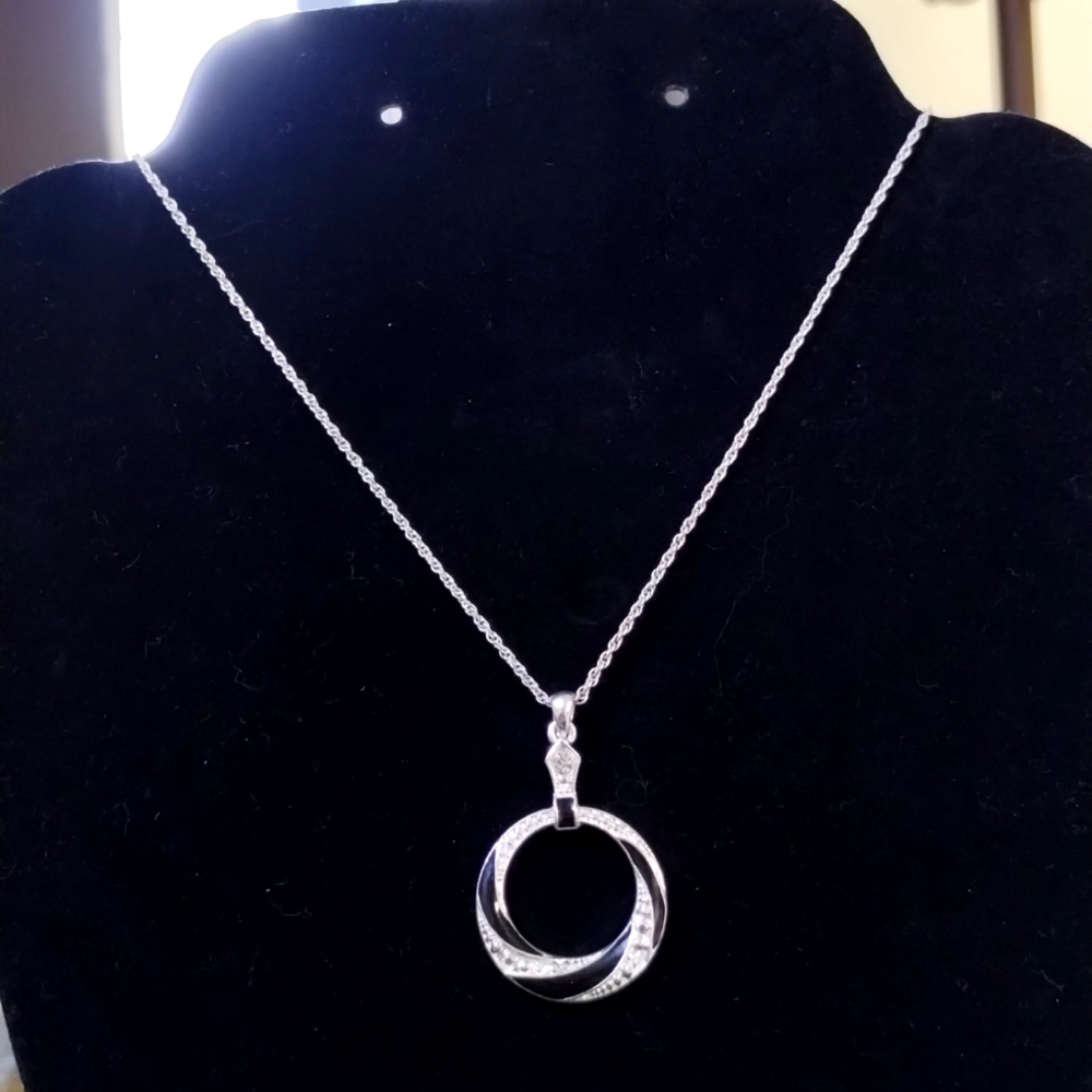 Vintage "SHA" silver tone signed spiral link chain with round rhinestone pendant
